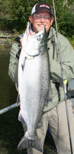 Guide Andy Martin of Wild Rivers Fishing with a chromer Smith River king salmon.