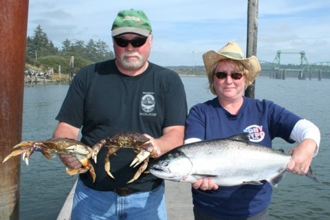 Kevin and Maggie of Portland with salmon and crab from the lower Coquille River.