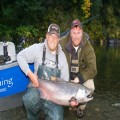 Guide Andy Martin and Salmon Trout Steelheader editor Nick Amato with a king from the upper Chetco.
